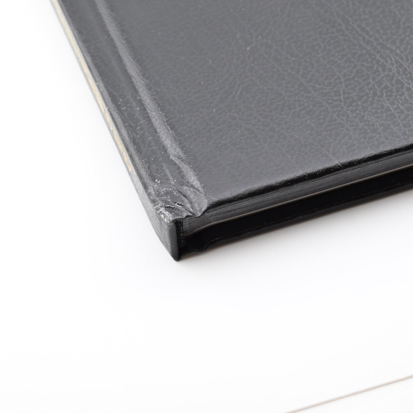 Close-up of damaged spine of The Legendary Photography of Tony Hurst
