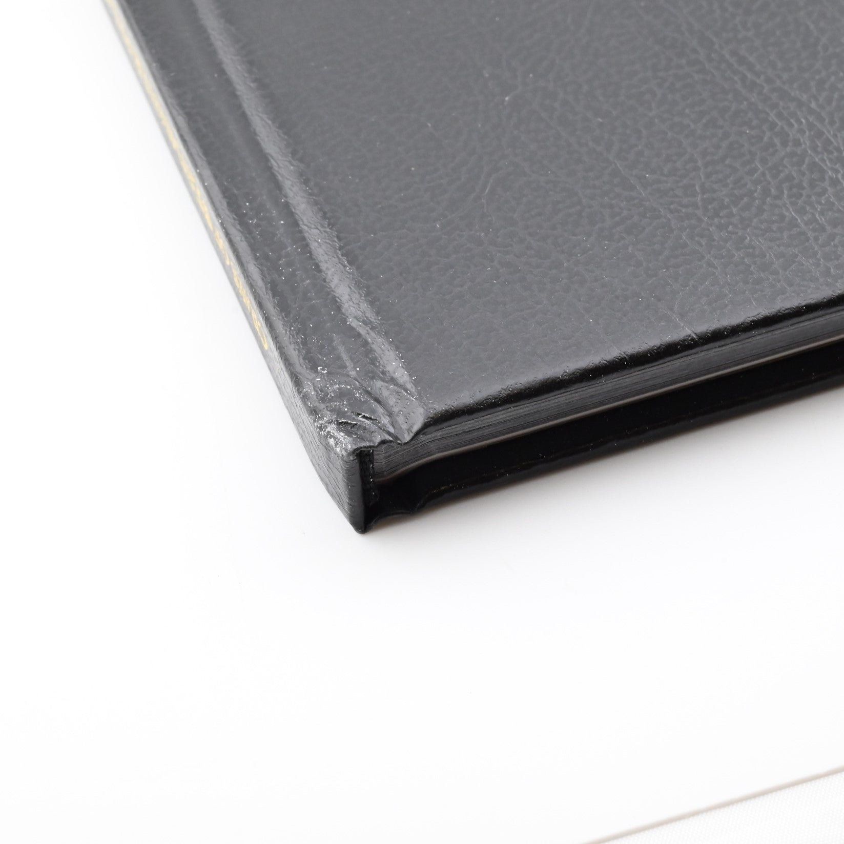 Close-up of damaged spine of The Legendary Photography of Tony Hurst